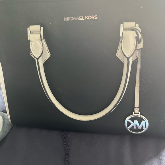 Michael Kors Handbags - Black and greyish/whitish Michael kors hand bag. Marks shown in picture.